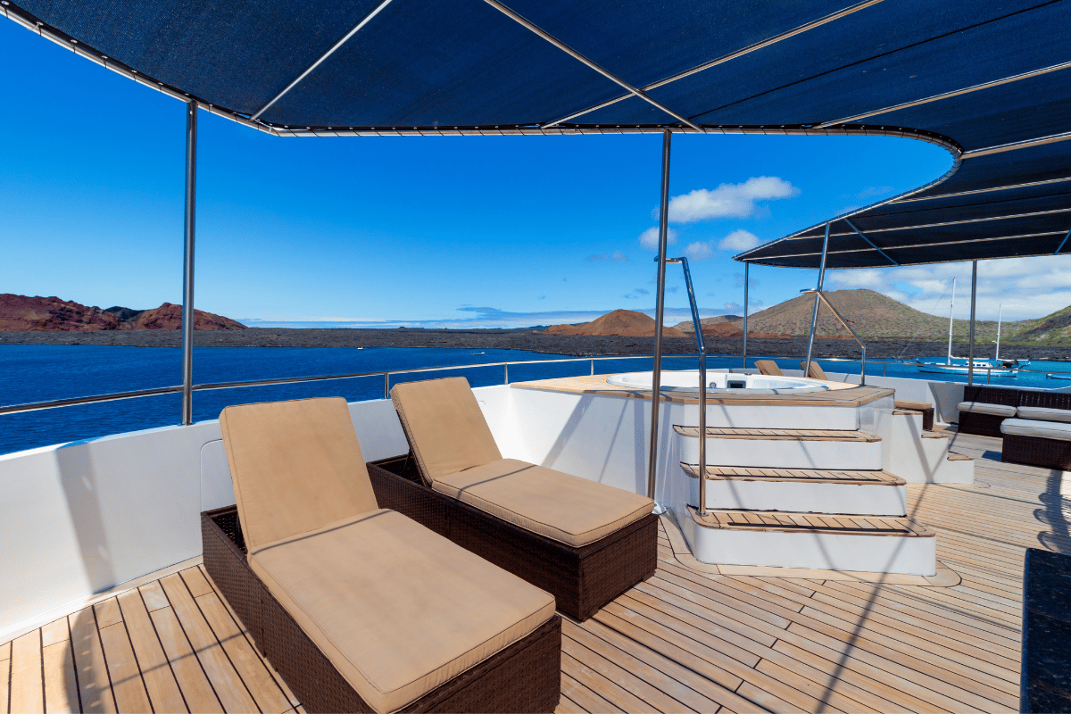 Upper balcony aboard a Galápagos expedition vessel overlooking the sea