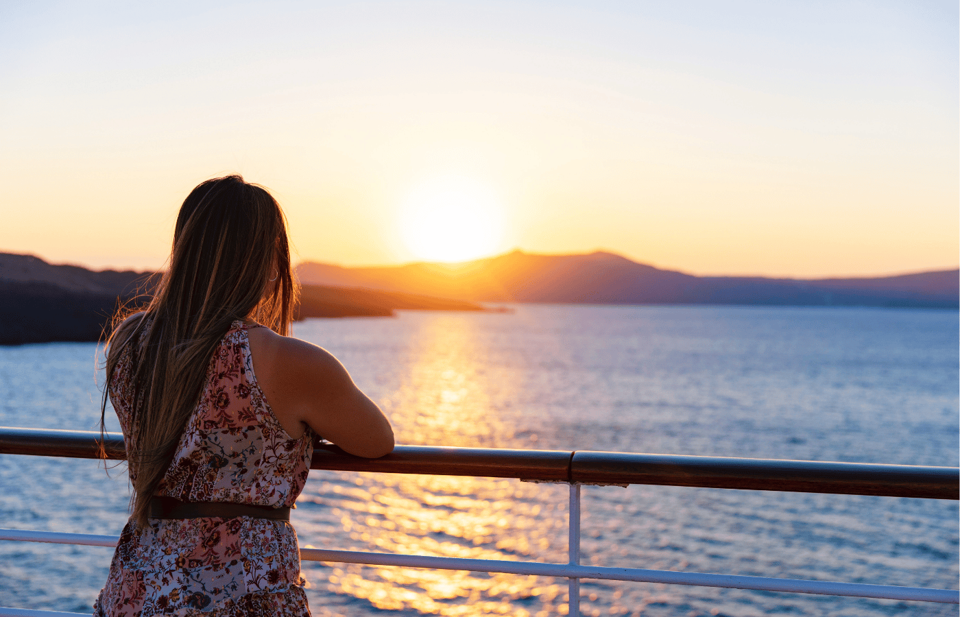 Sunset over Santorini during a small-ship Mediterranean cruise